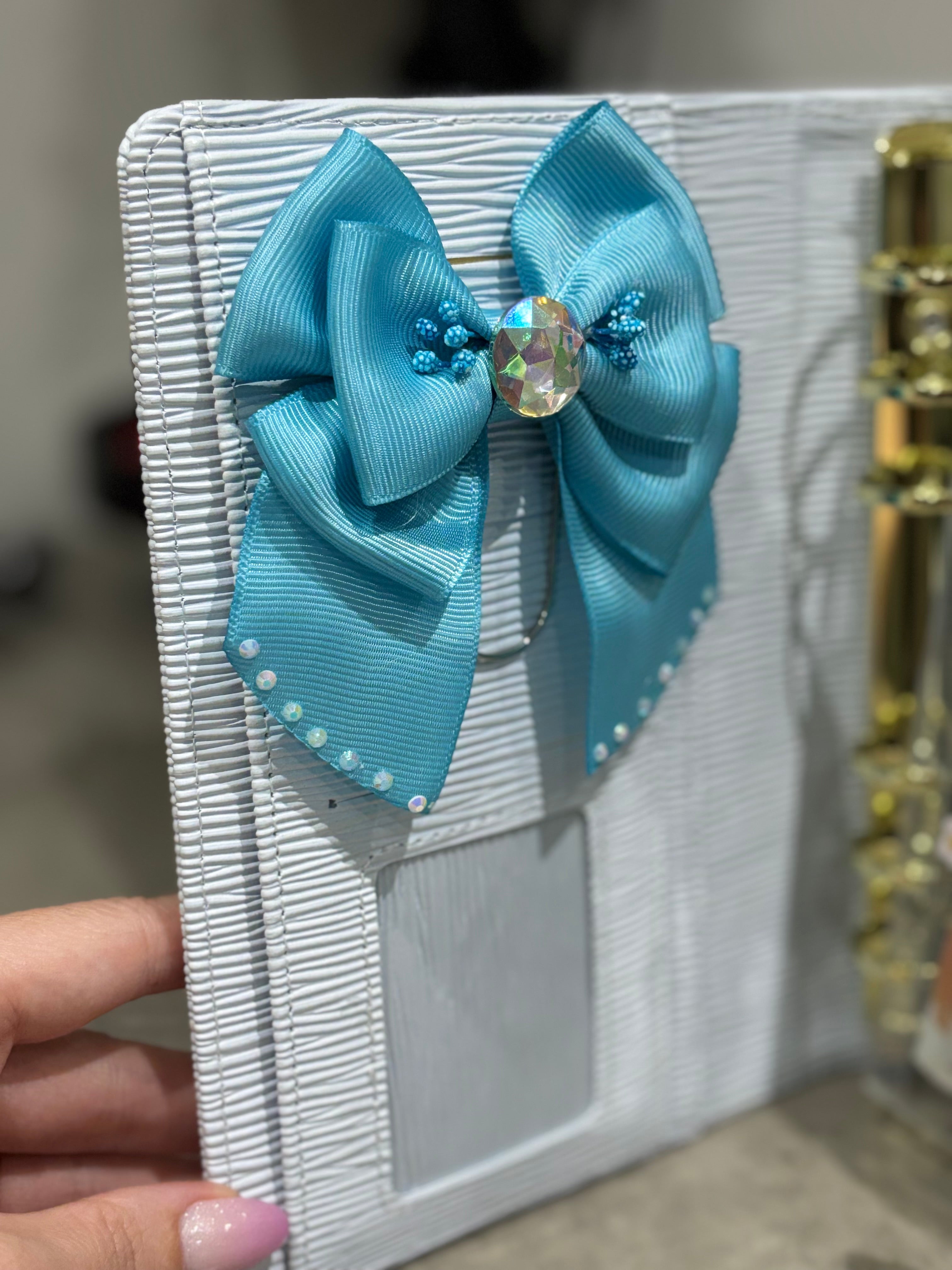 Blue bow binder clip