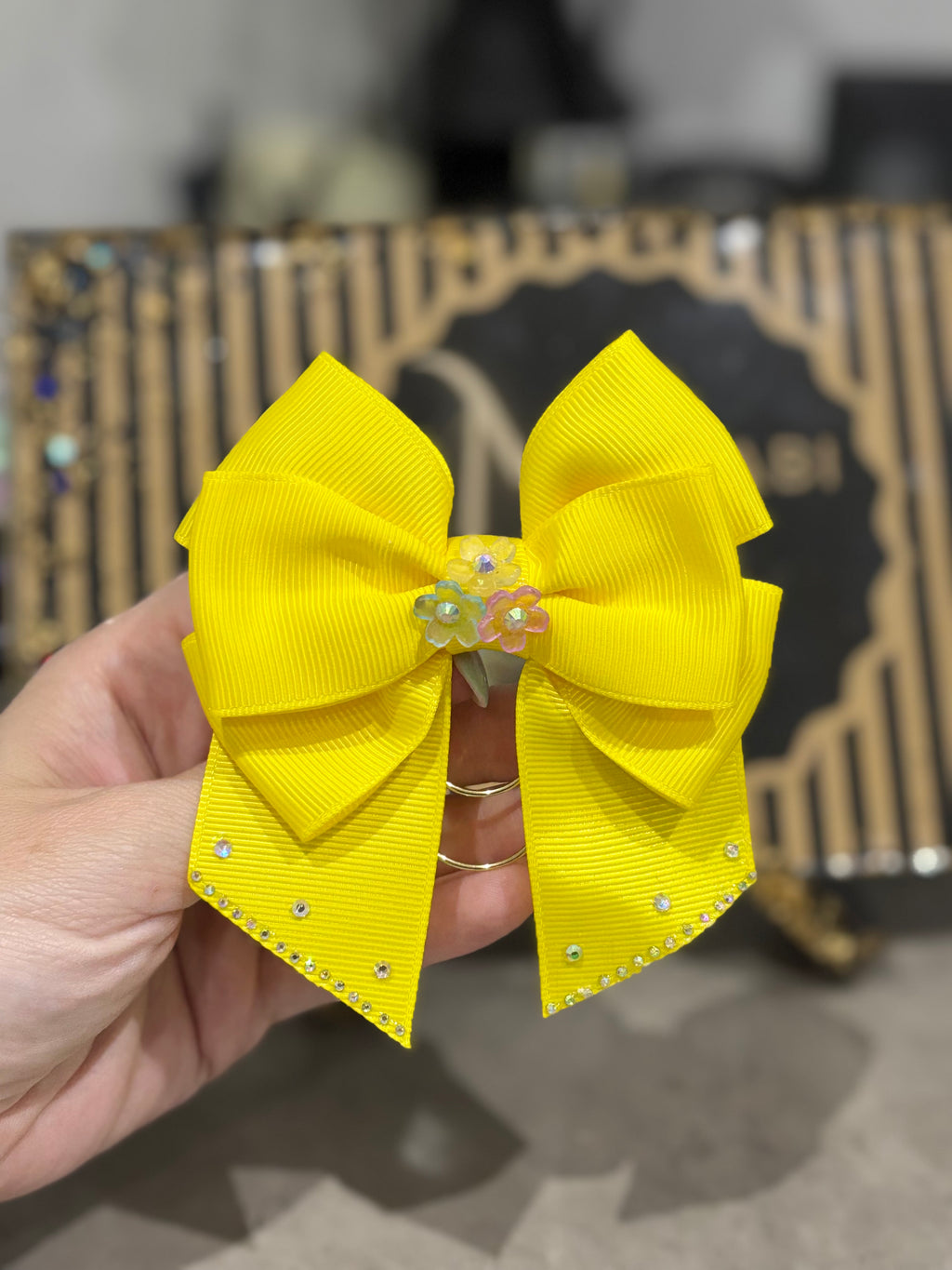 Bright yellow binder bow clip