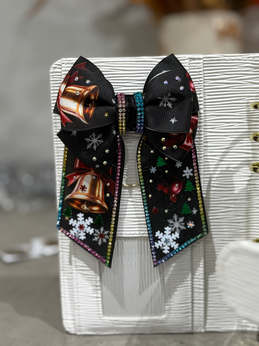 Winter bell binder bow clip
