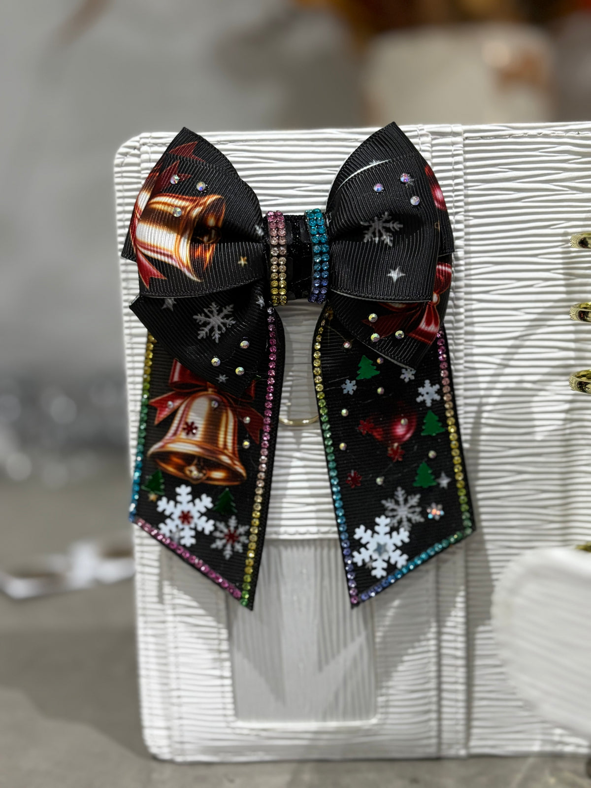 Winter bell binder bow clip