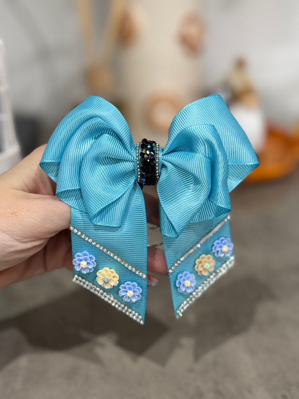 Blue binder bow clip