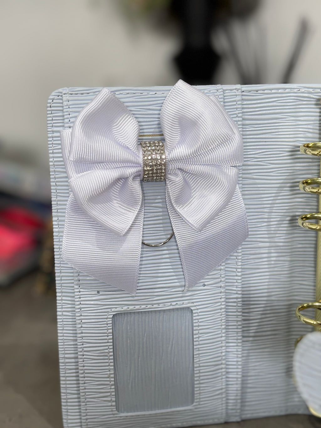 White bow binder clip