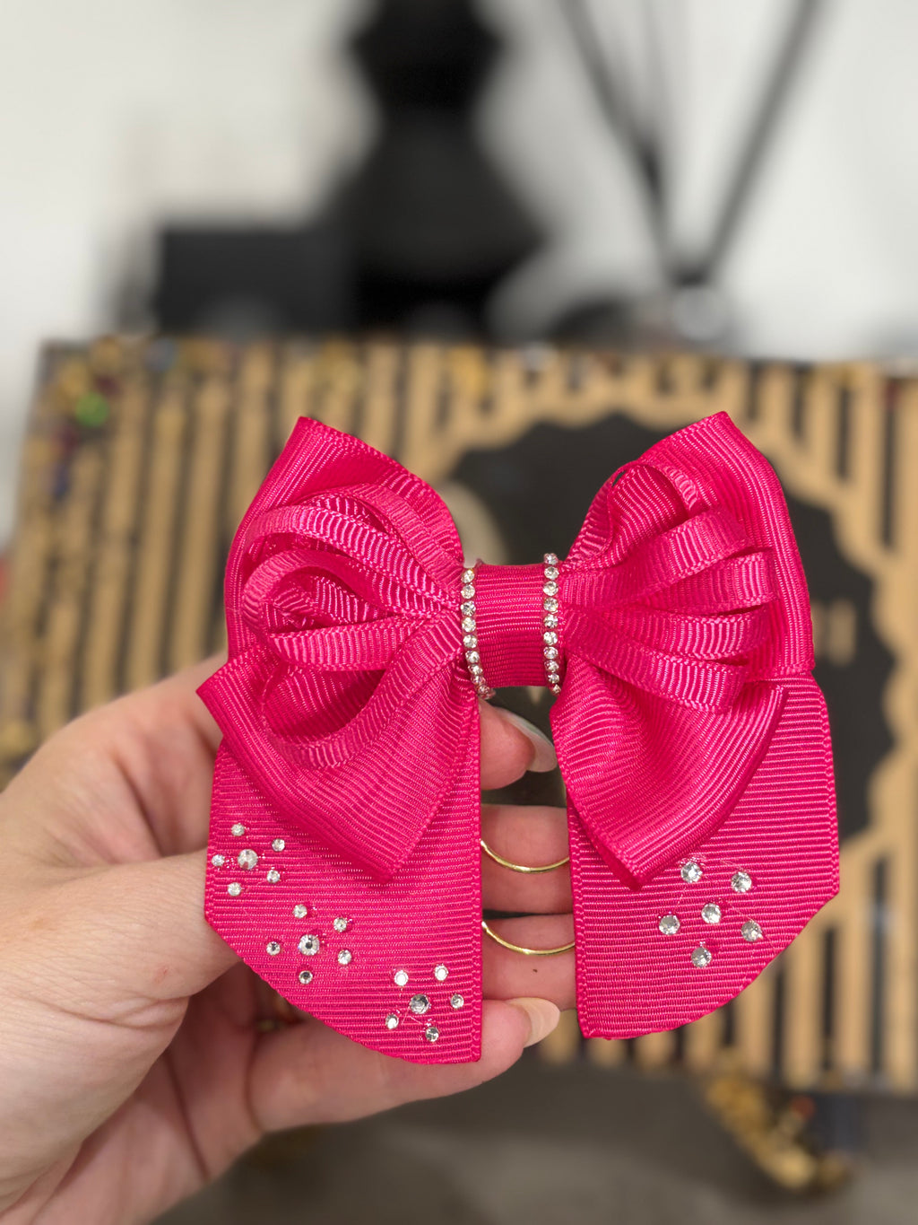 Dark pink bow binder clip