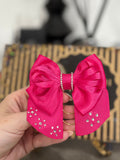 Dark pink bow binder clip