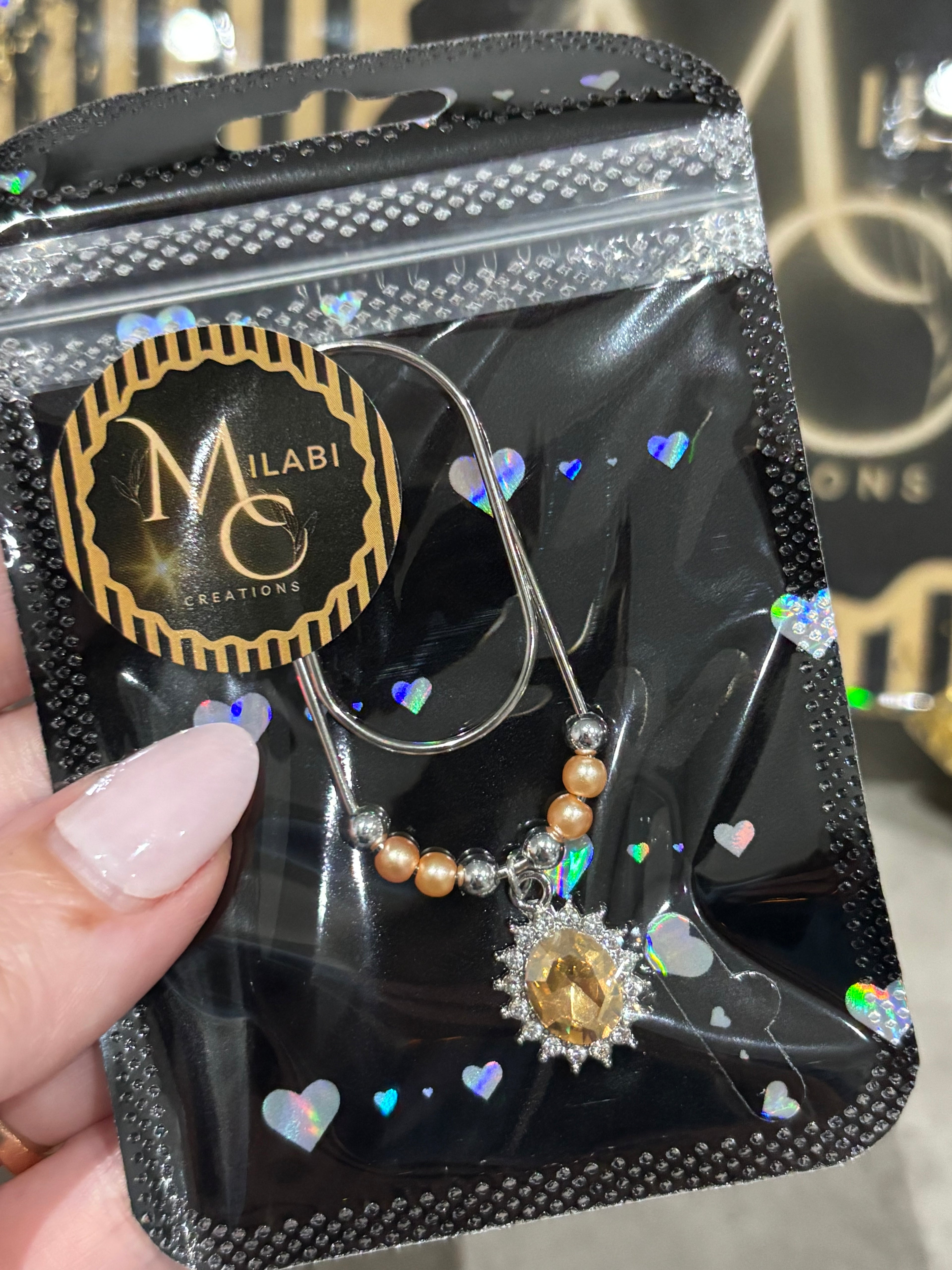 Oval diamond binder charm