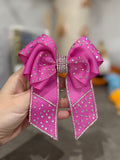 Bright pink binder bow clip
