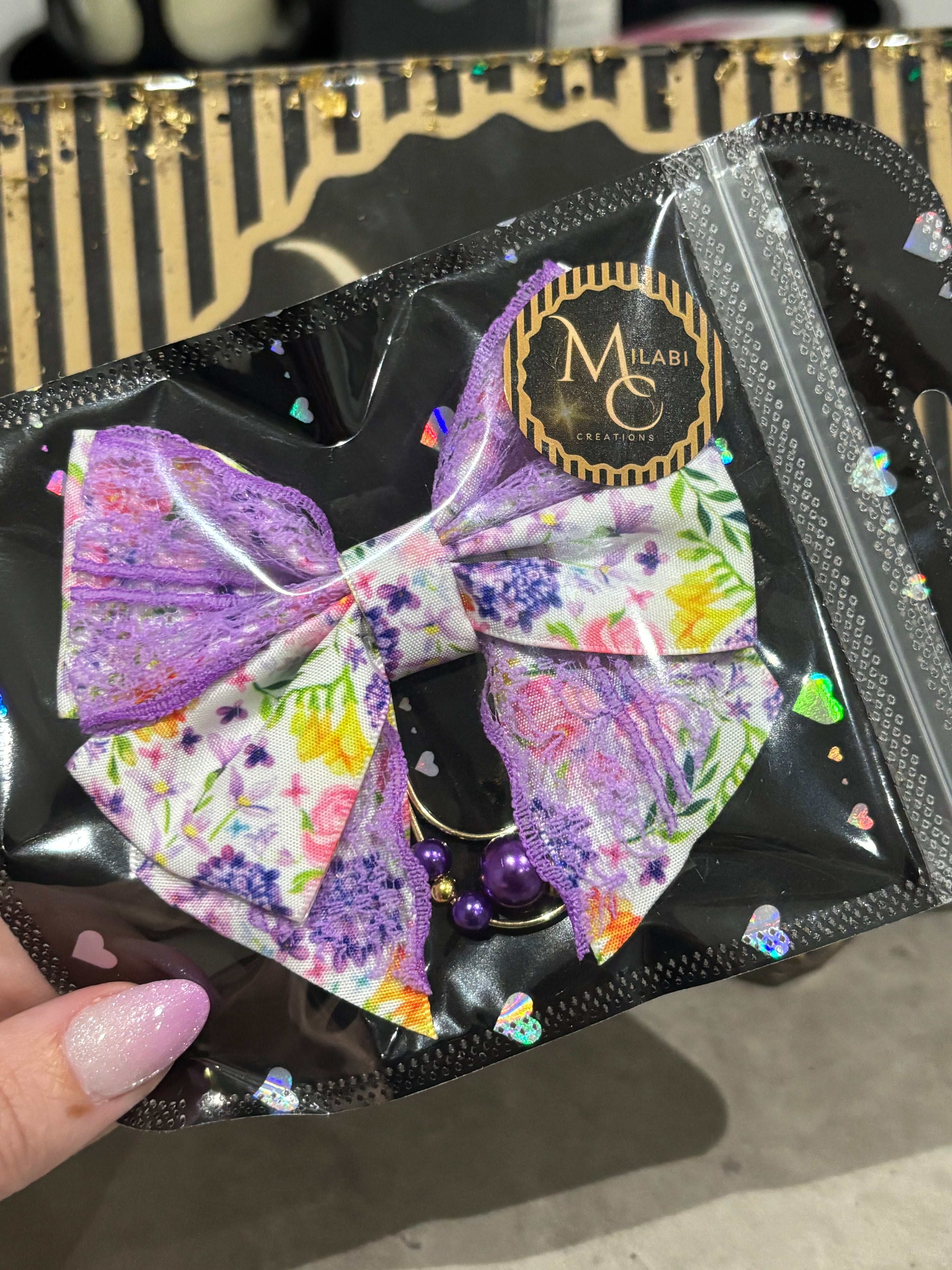 Purple flower bow binder clip