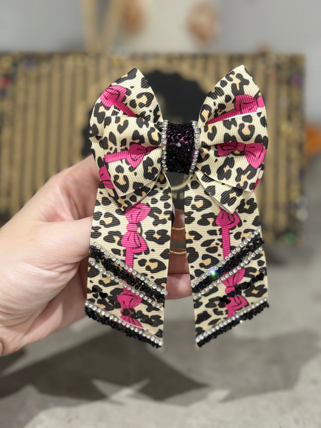 Leopard print binder bow clip