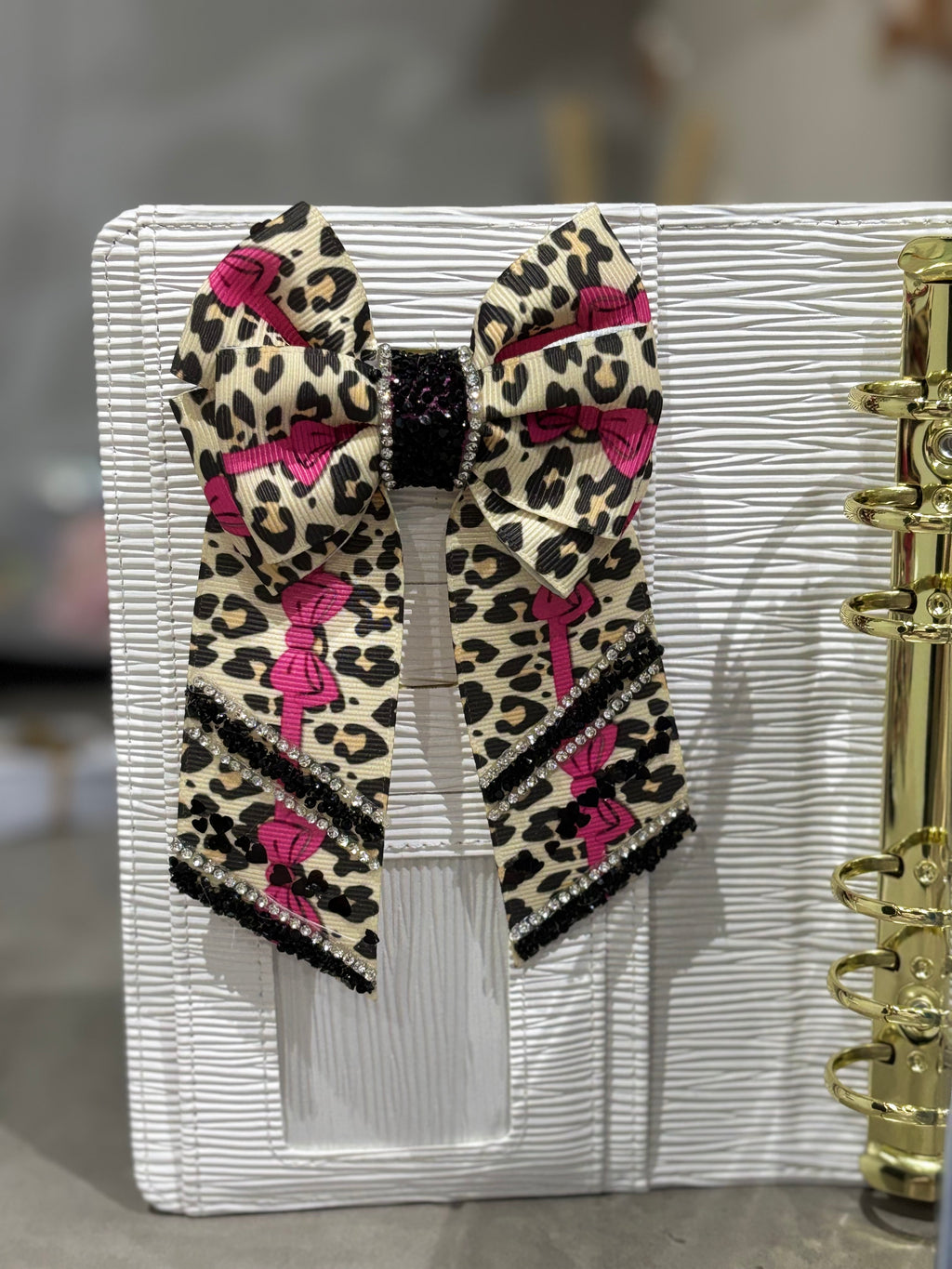 Leopard print binder bow clip