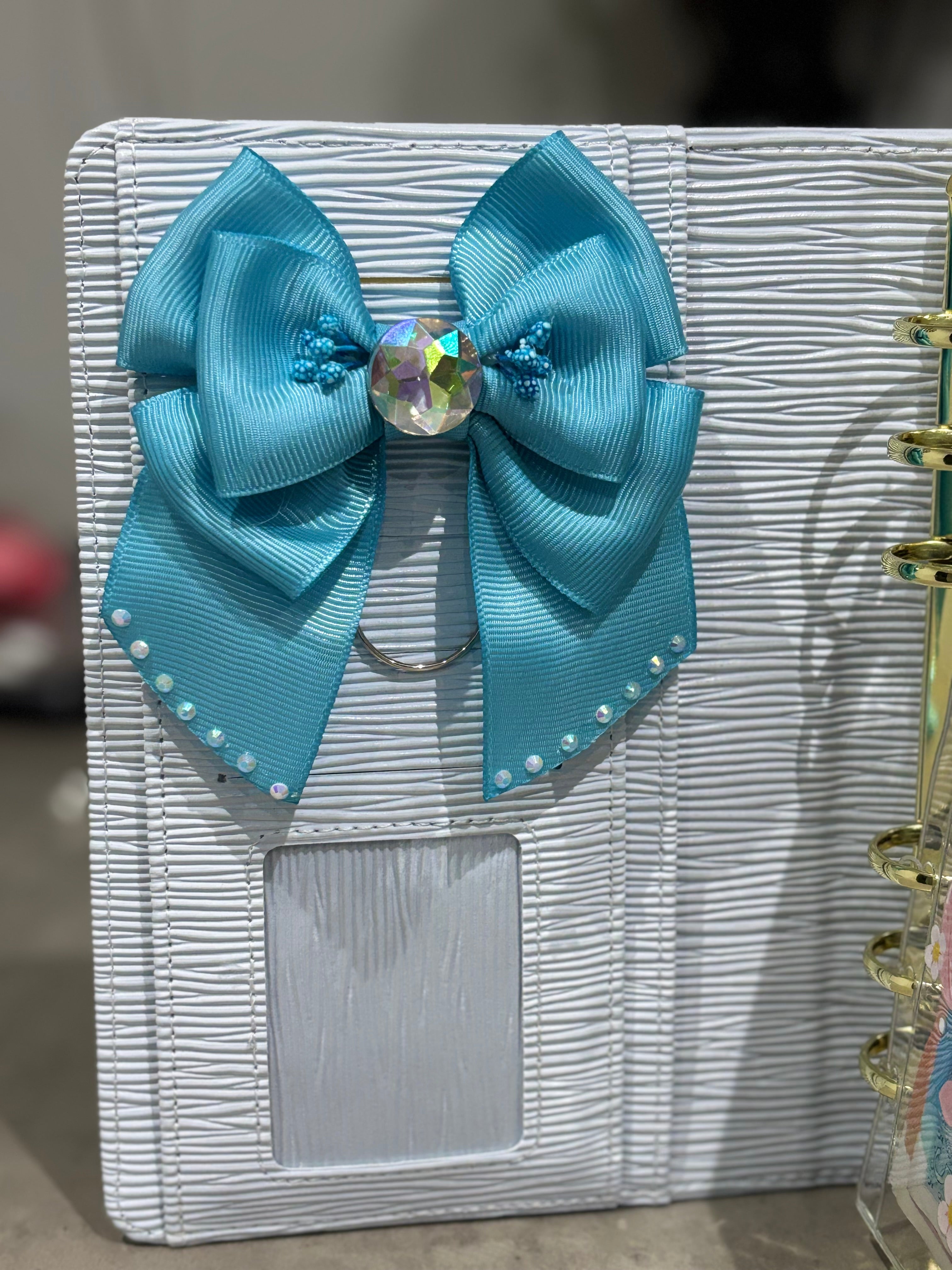 Blue bow binder clip