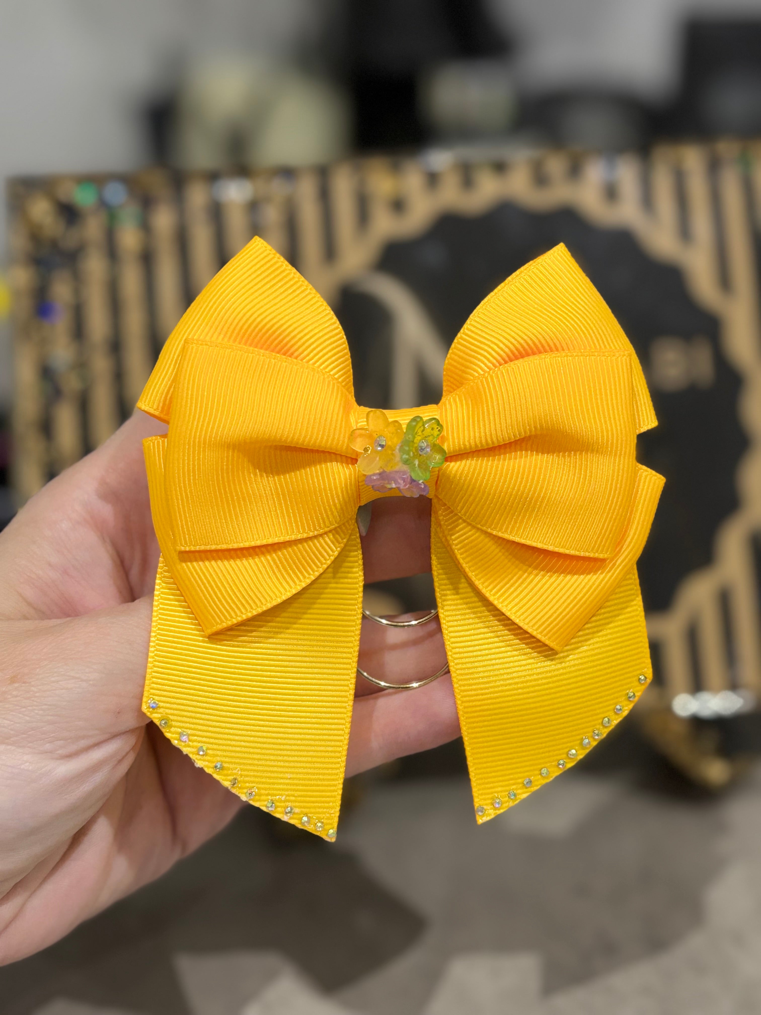 Bright orange binder bow clip