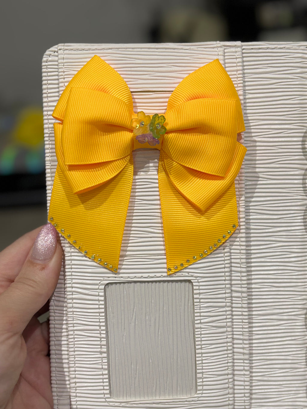 Bright orange binder bow clip