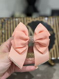 Pastel pink binder bow clip