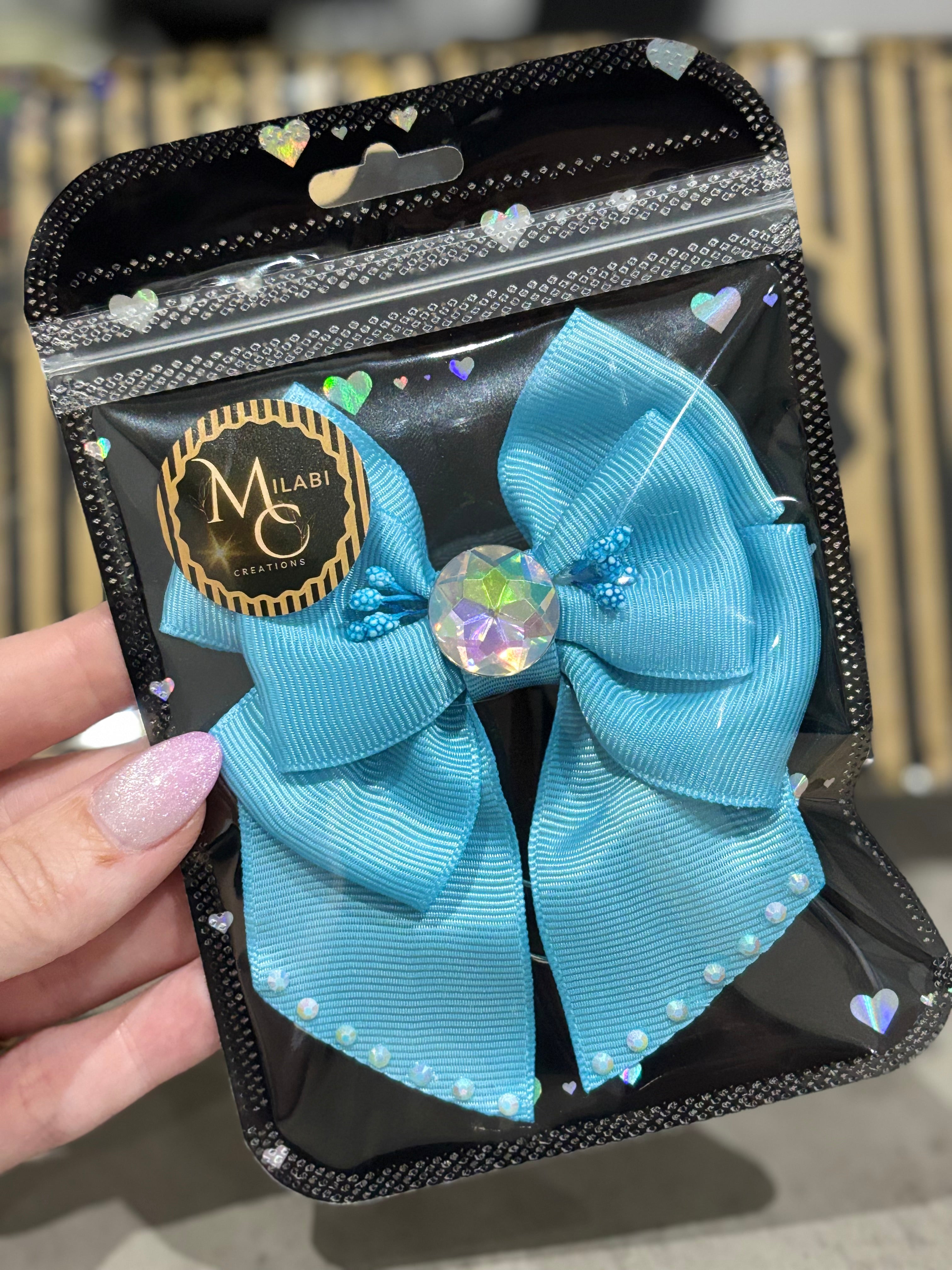 Blue bow binder clip