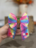 Bright rainbow binder bow clip