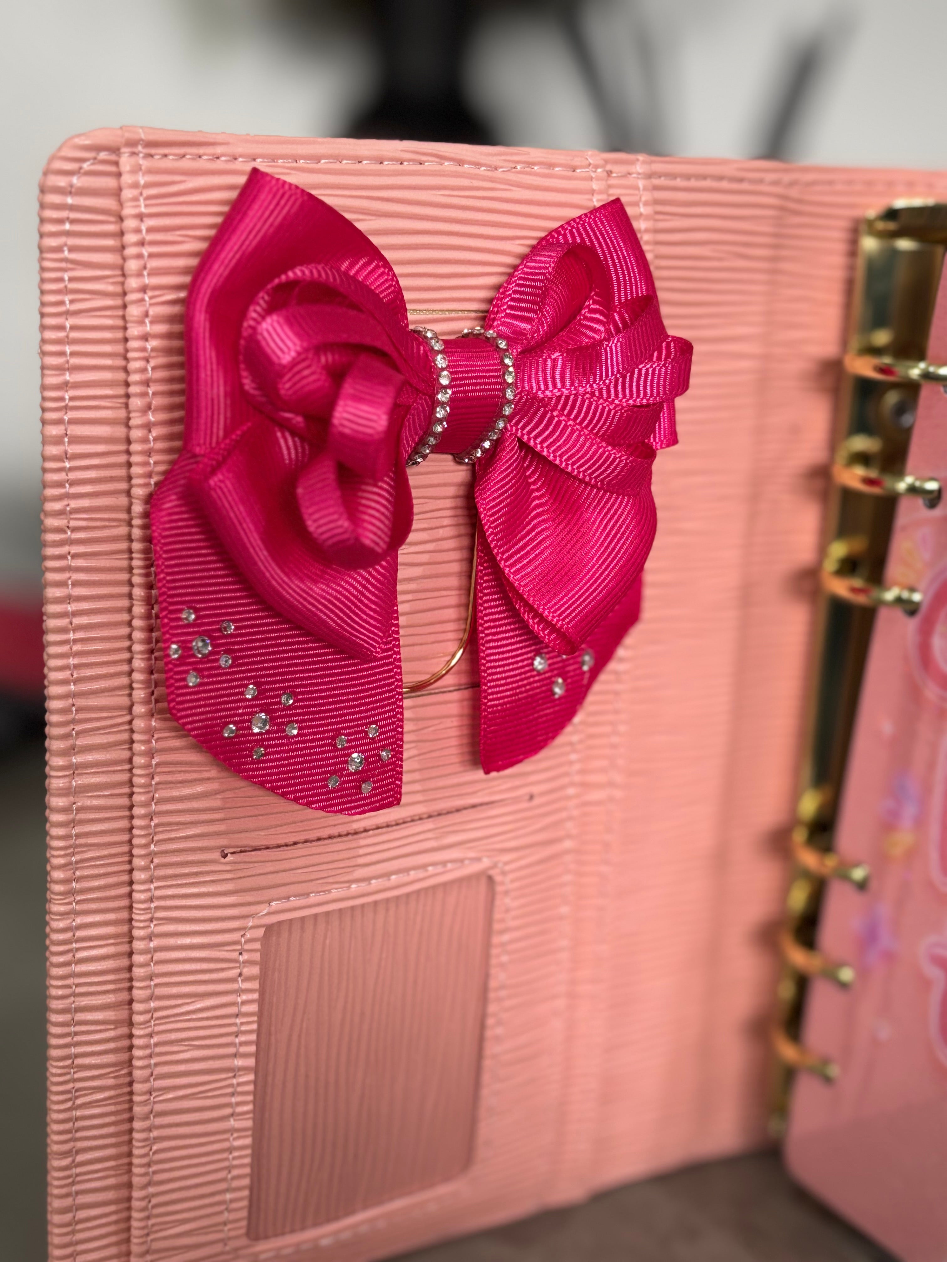 Dark pink bow binder clip