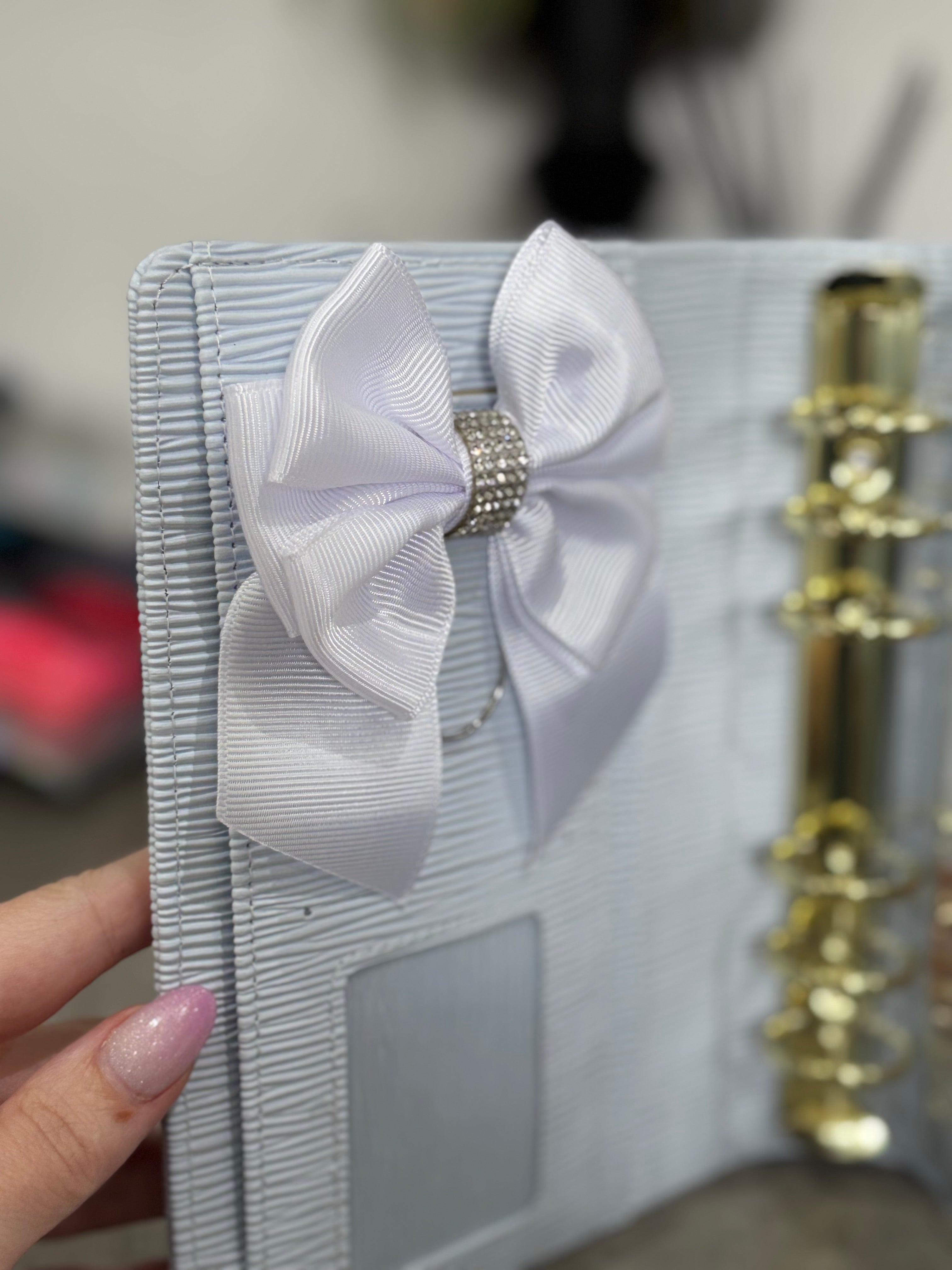 White bow binder clip