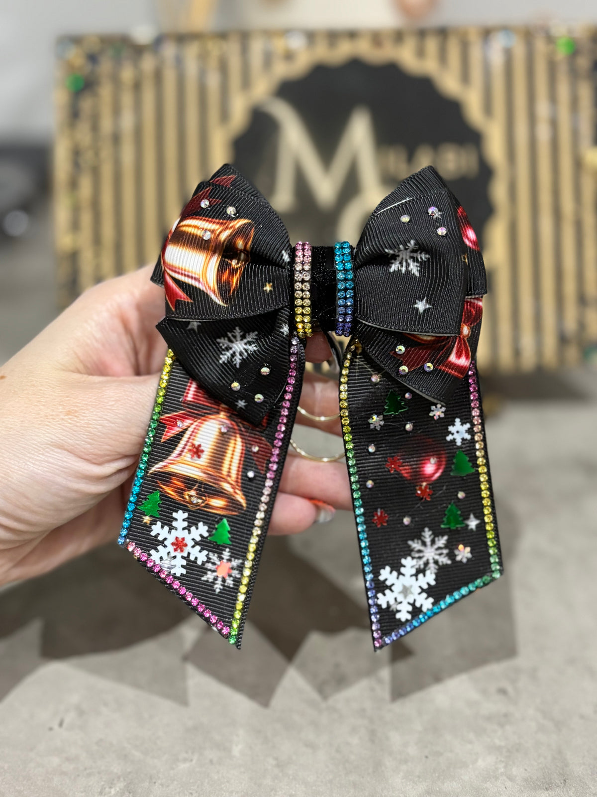 Winter bell binder bow clip