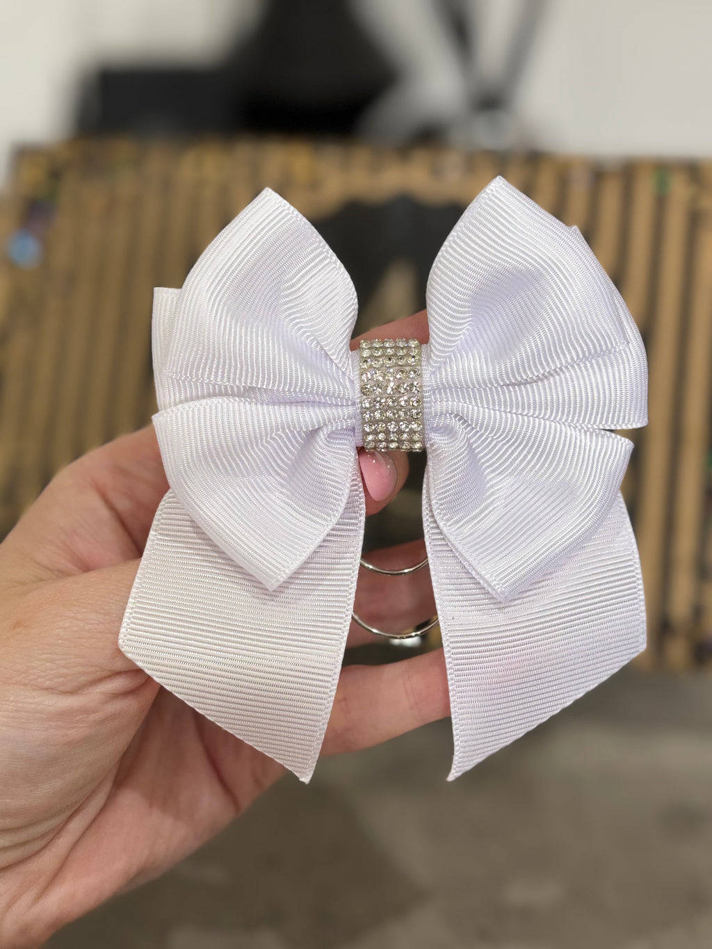 White bow binder clip