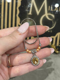 Oval diamond binder charm