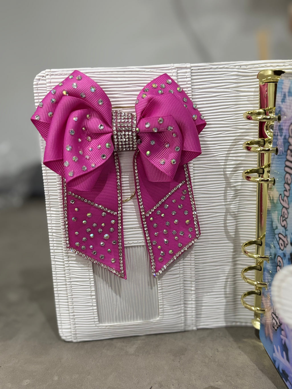 Bright pink binder bow clip