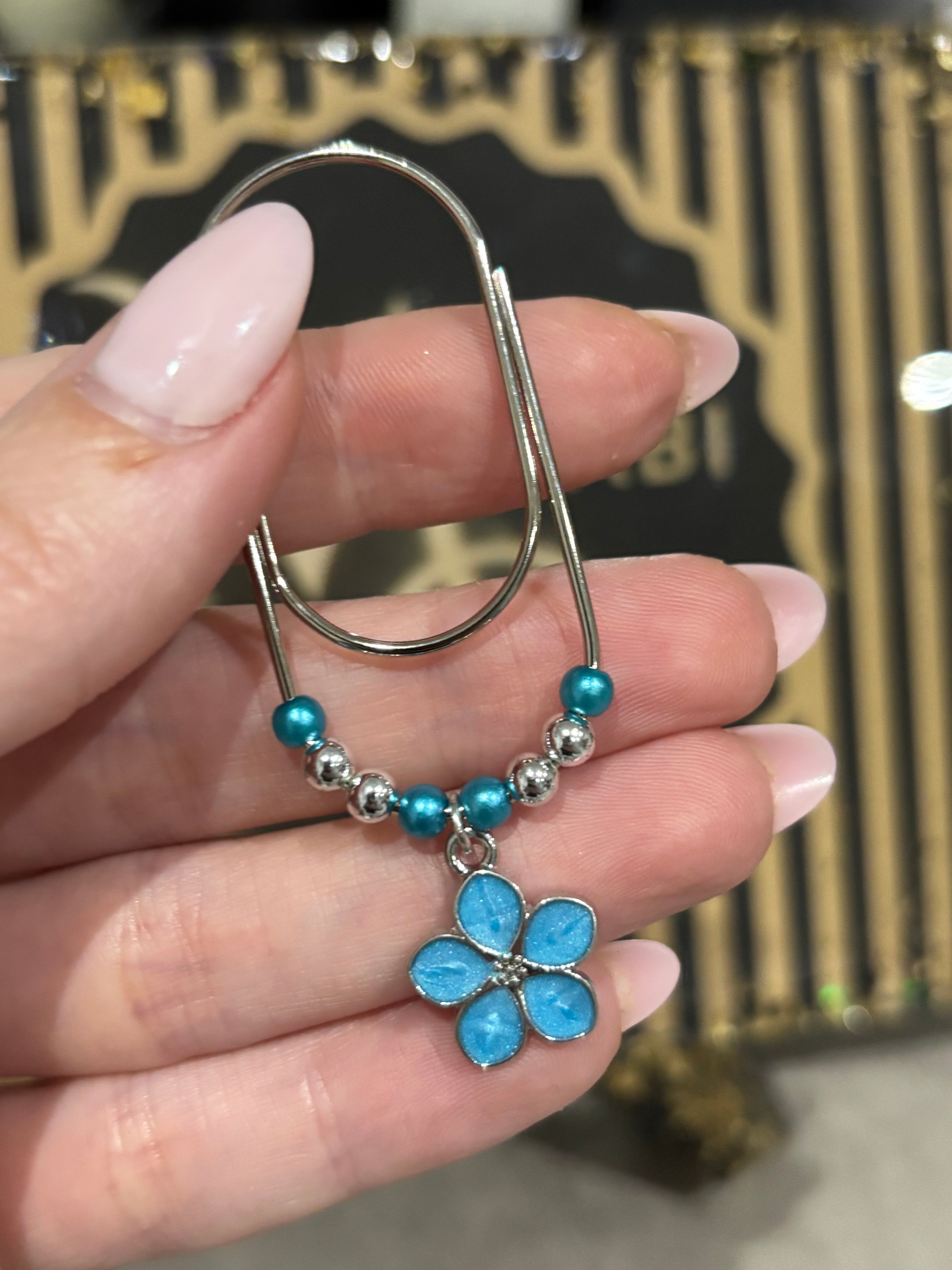 Blue flower binder pocket charm
