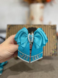Blue binder bow clip