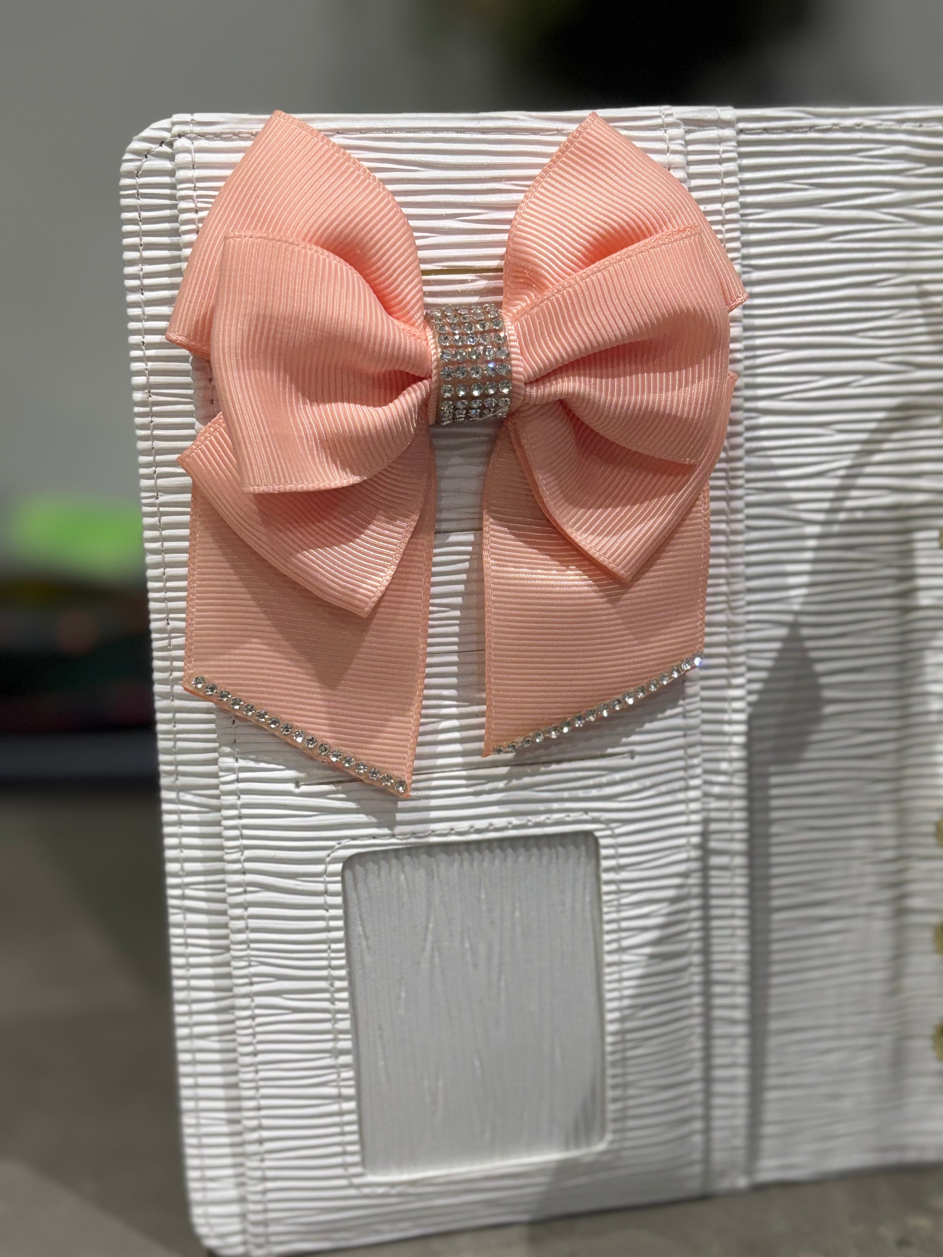 Pastel pink binder bow clip