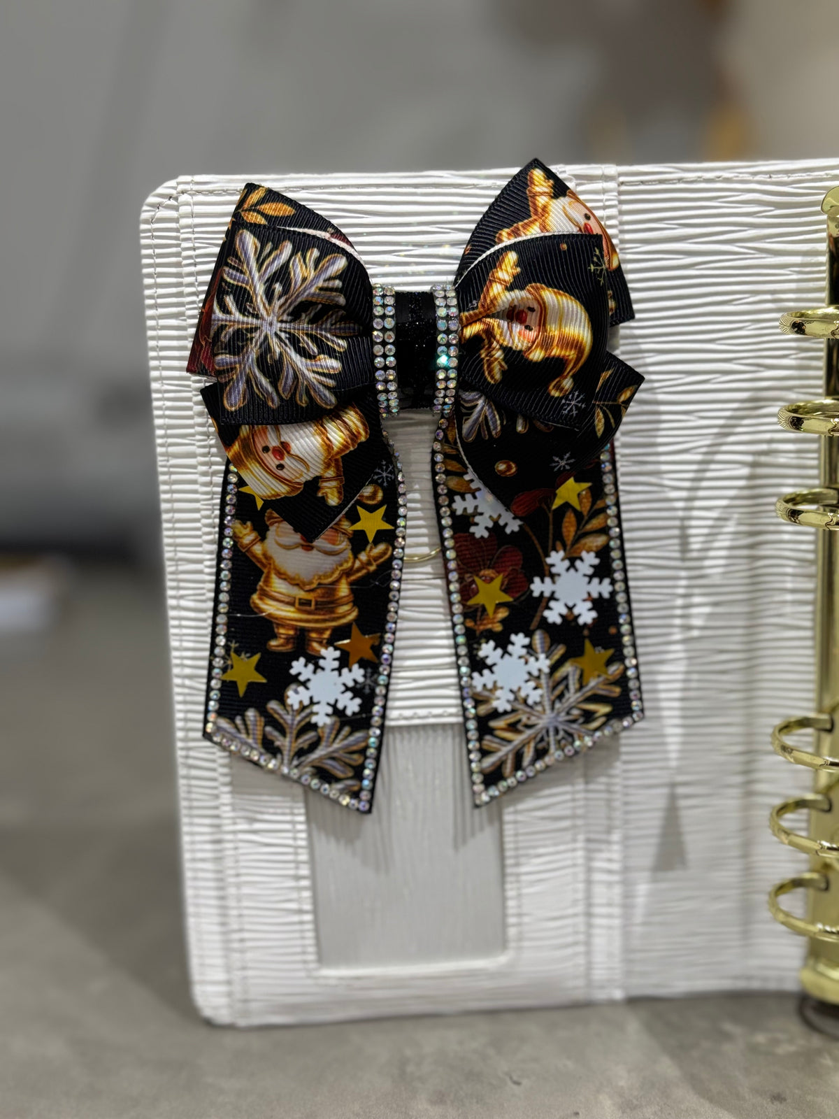 Golden winter binder bow clip