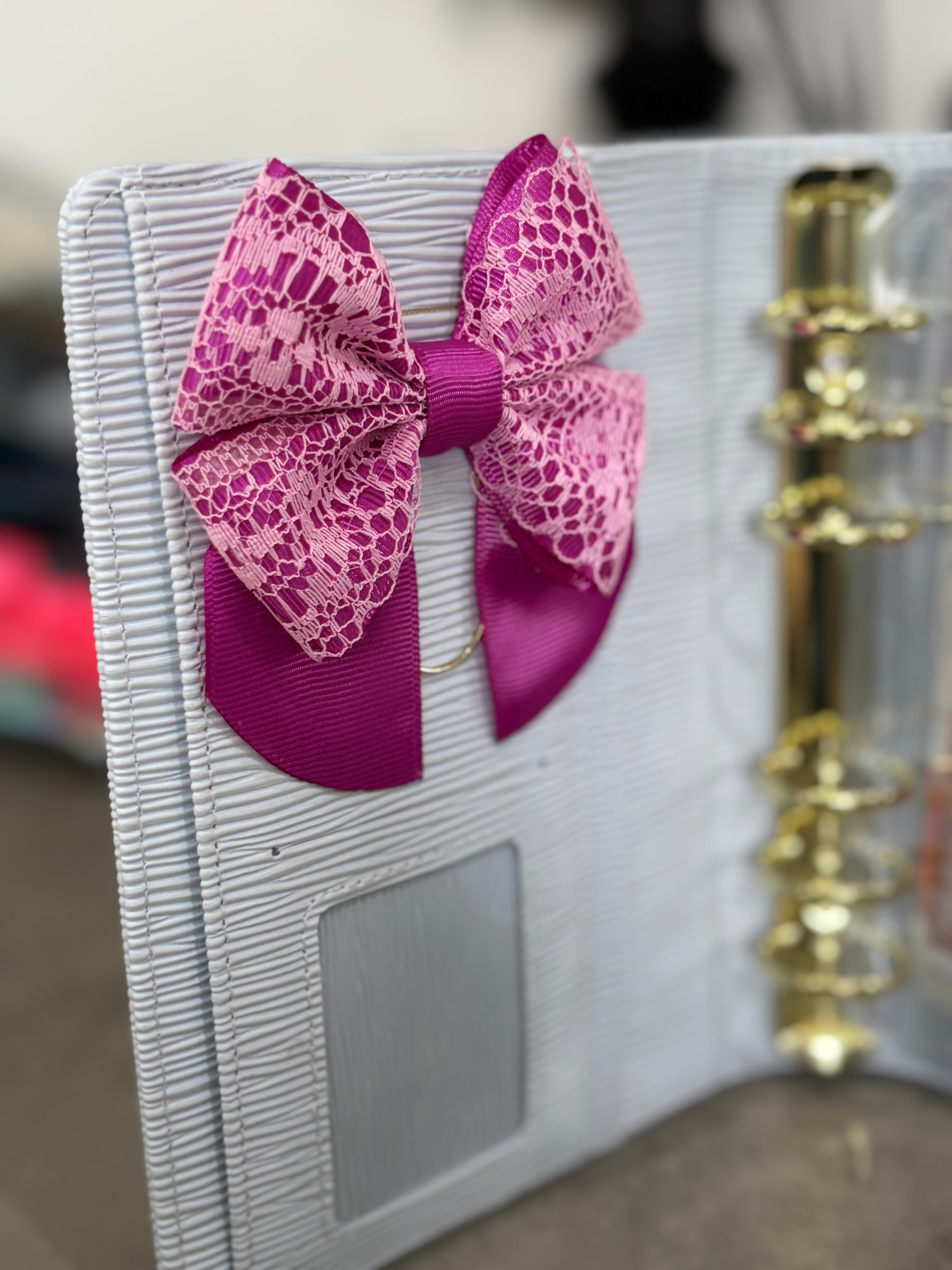 Purple bow binder clip