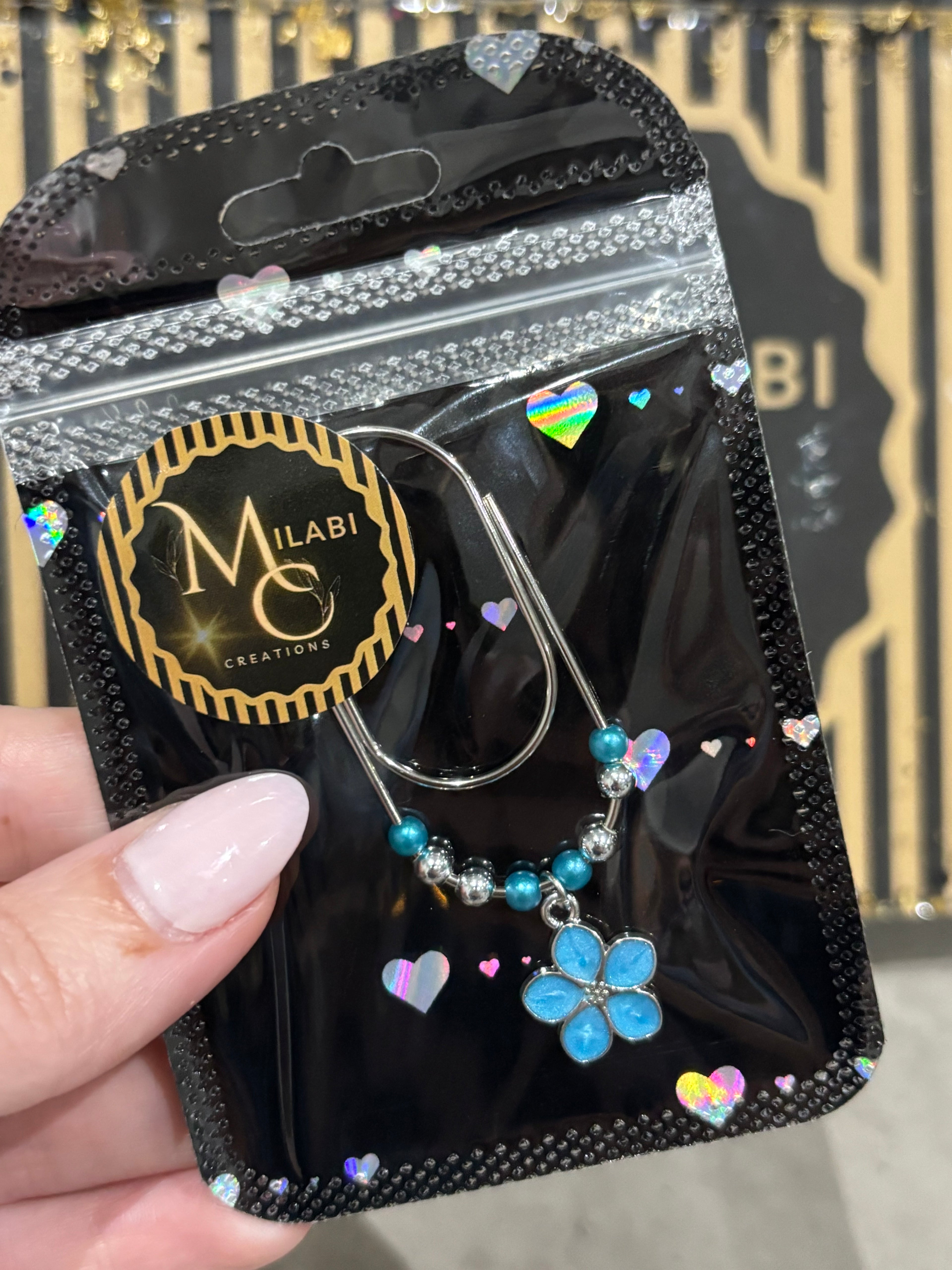 Blue flower binder pocket charm