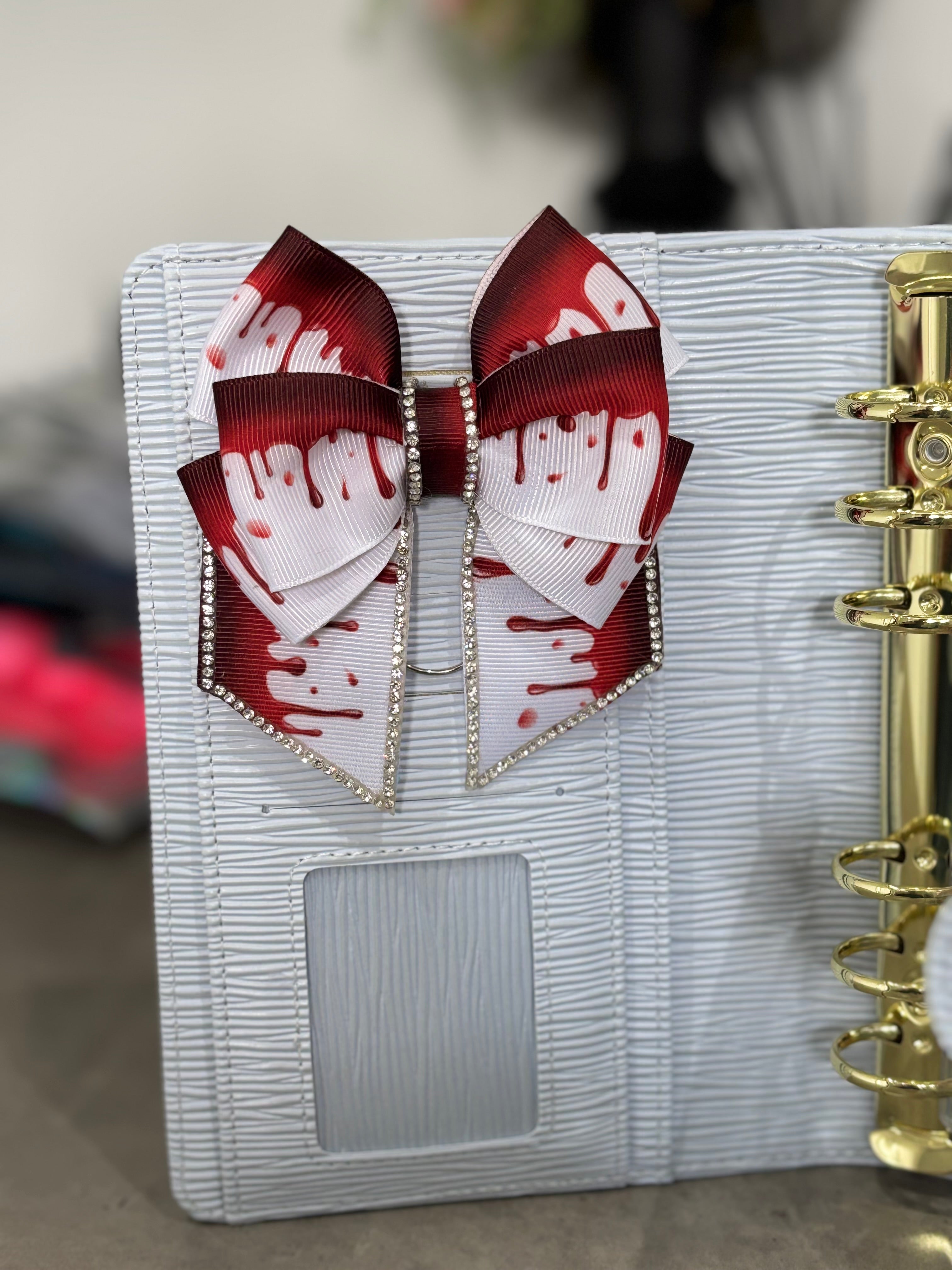 Bloody bow binder clip