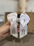 White binder bow clip