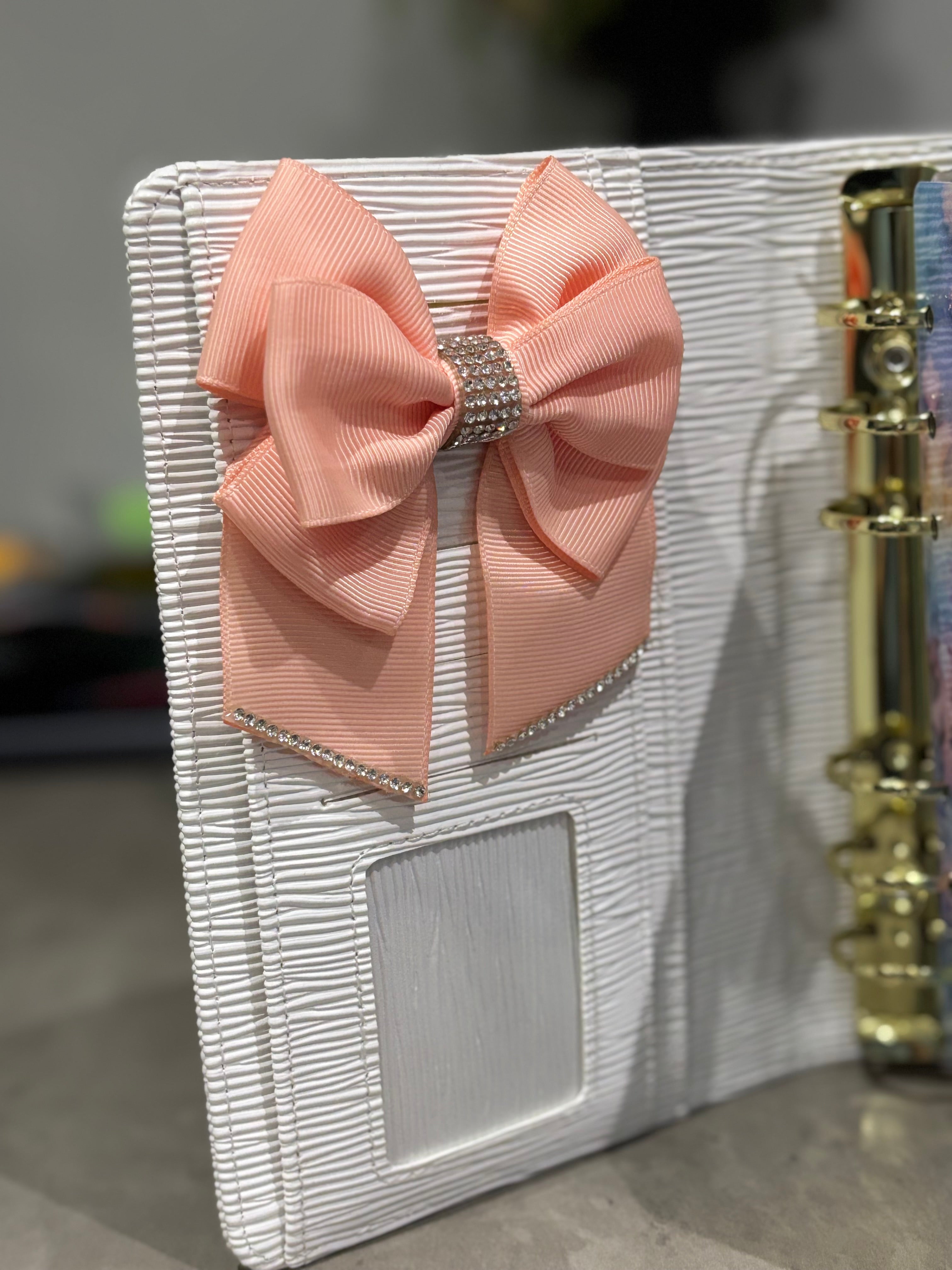 Pastel pink binder bow clip