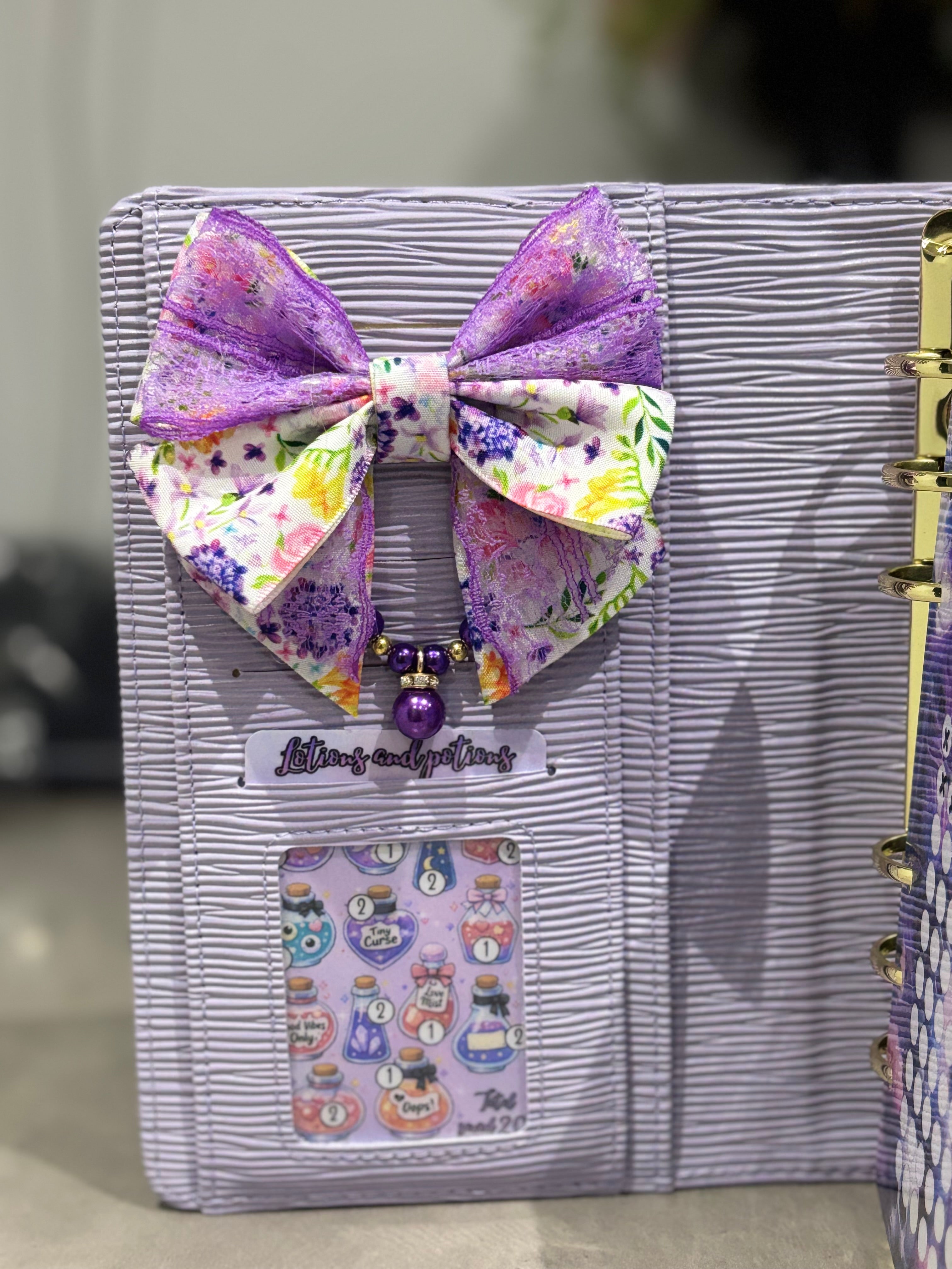 Purple flower bow binder clip