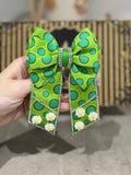 Green circles binder bow clip