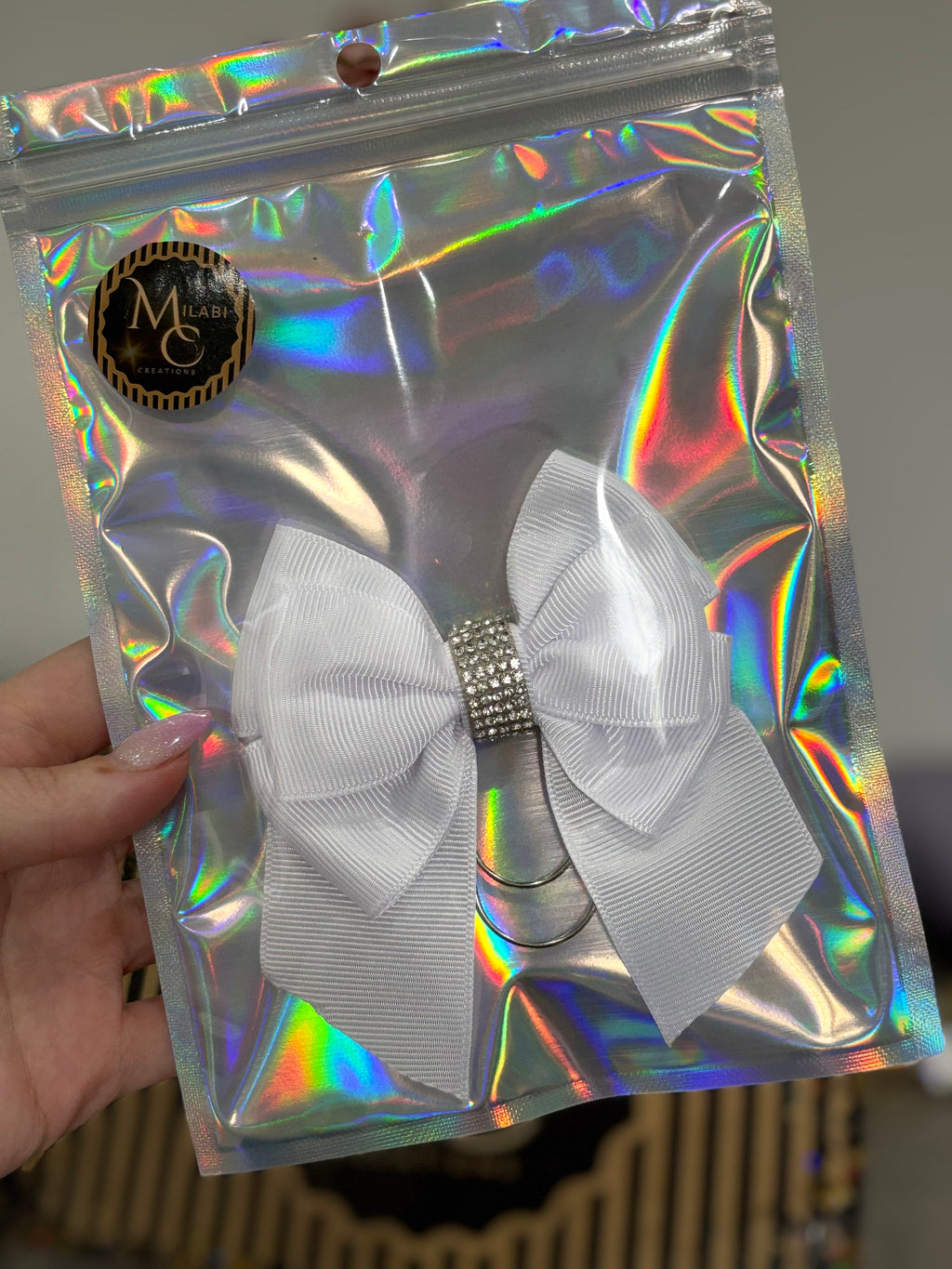 White bow binder clip