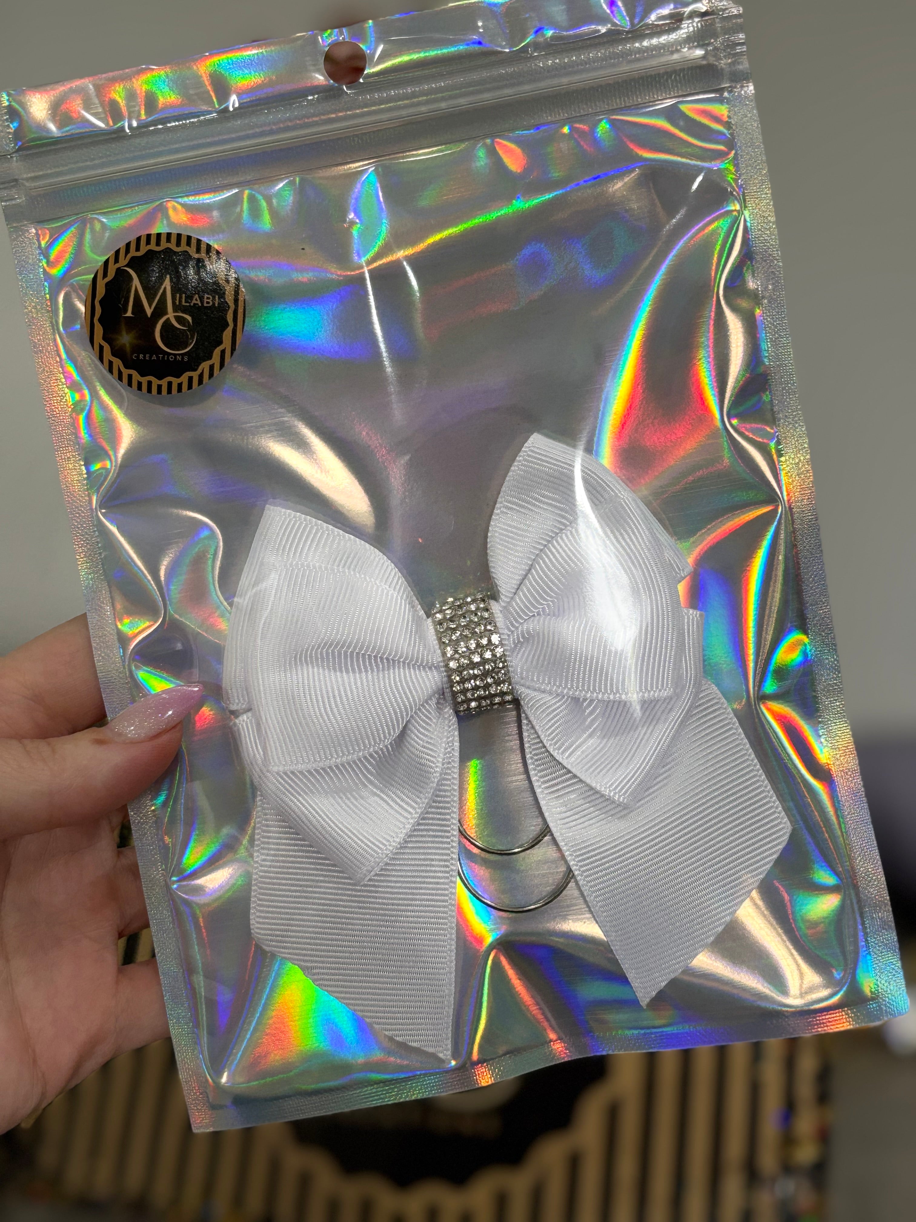 White bow binder clip